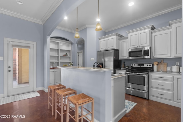 kitchen featuring arched walkways, concrete flooring, appliances with stainless steel finishes, white cabinetry, and a center island