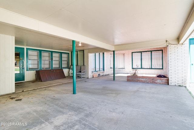 view of patio featuring a carport