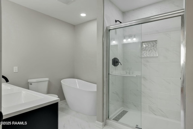 bathroom with vanity, a soaking tub, a stall shower, and marble finish floor