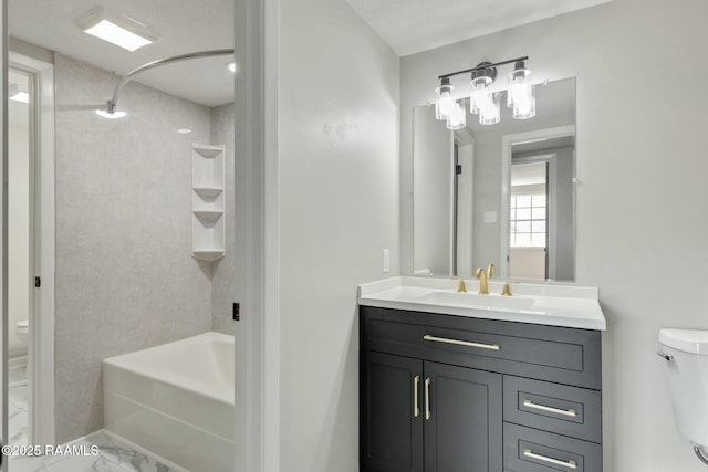 full bathroom featuring vanity, shower / bathing tub combination, toilet, and marble finish floor