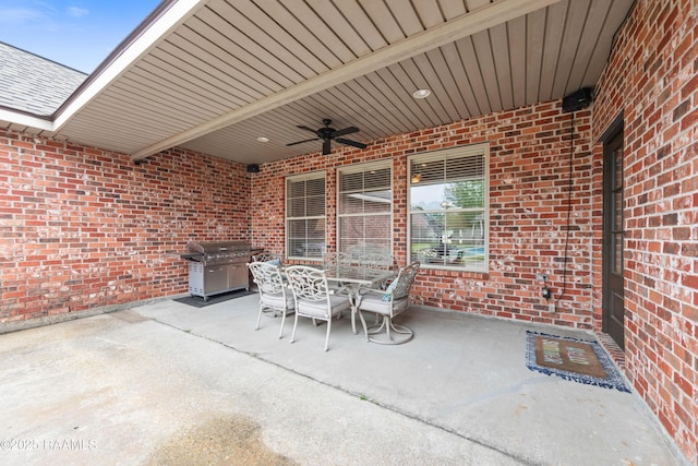 view of patio / terrace with ceiling fan, outdoor dining space, and grilling area