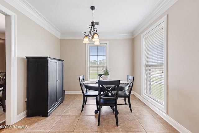 dining space featuring light tile patterned floors, ornamental molding, baseboards, visible vents, and a notable chandelier
