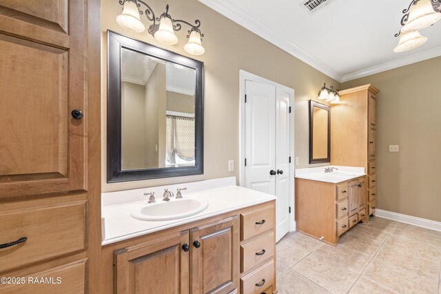 full bath with visible vents, crown molding, two vanities, a sink, and tile patterned flooring