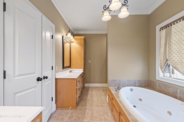 full bath featuring tile patterned floors, crown molding, vanity, a chandelier, and a tub with jets