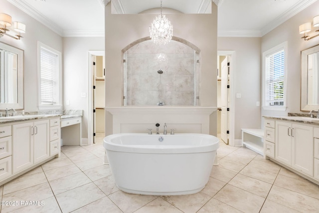 bathroom featuring a notable chandelier, tile patterned floors, a sink, and tiled shower