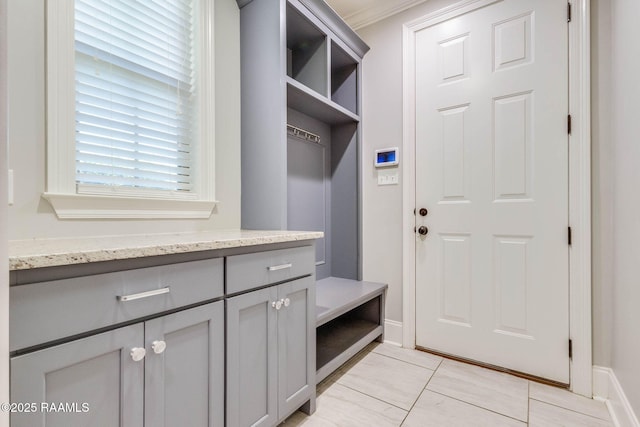 mudroom featuring baseboards