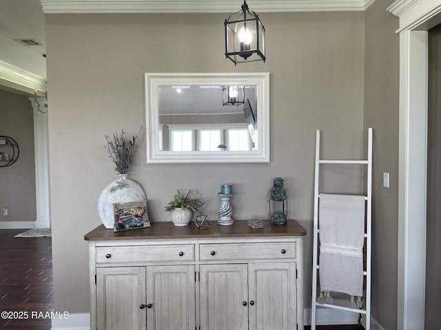 3713 Vidrine Rd, Ville Platte, LA 70586 - detailed view of wood finished floors, baseboards, and ornamental molding