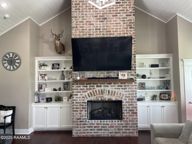 3713 Vidrine Rd, Ville Platte, LA 70586 - living area with vaulted ceiling, crown molding, a brick fireplace, wood ceiling, and dark wood-style floors
