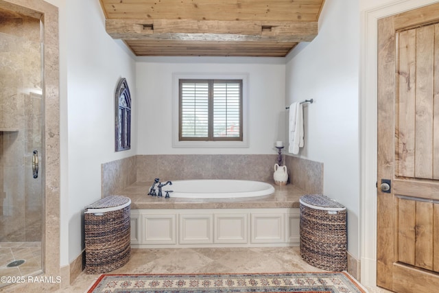 bathroom with a bath, tile patterned flooring, wooden ceiling, and a stall shower