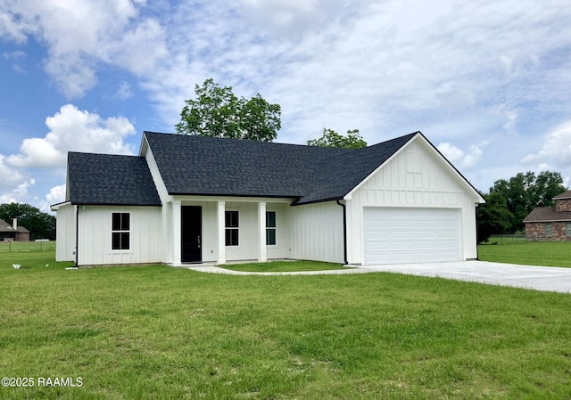 127 Guard Rd, Scott, LA 70583 - modern farmhouse with a shingled roof, driveway, an attached garage, and board and batten siding