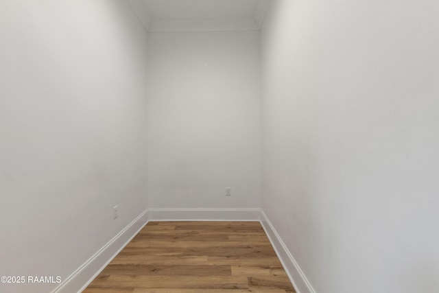 303 Canary Palm Way, Youngsville, LA 70592 - unfurnished room with light wood-type flooring and ornamental molding