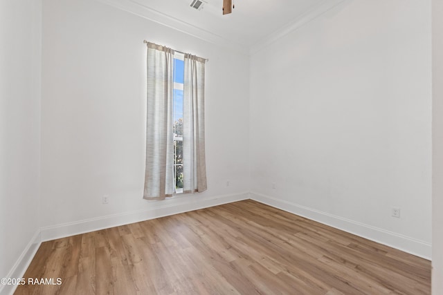 303 Canary Palm Way, Youngsville, LA 70592 - spare room featuring wood finished floors, ornamental molding, and a ceiling fan