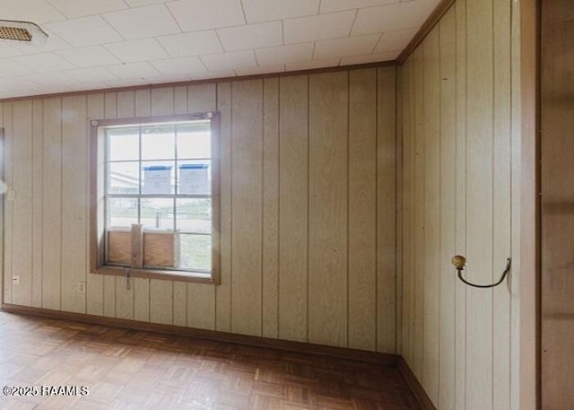 1010 Dugas Ln, Saint Martinville, LA 70582 - unfurnished room featuring wood walls and baseboards