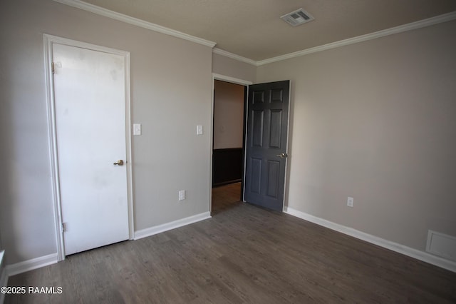 104 Raphael Dr, Lafayette, LA 70508 - unfurnished bedroom featuring wood finished floors and crown molding