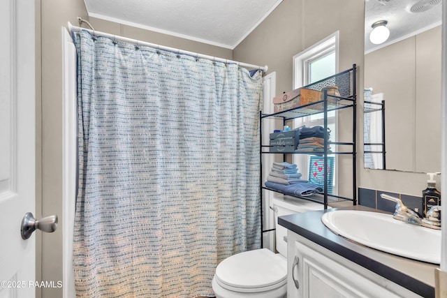 full bath featuring vanity, toilet, ornamental molding, a textured ceiling, and a shower with shower curtain