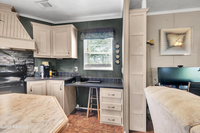 kitchen with ornamental molding, black / electric stove, custom range hood, and visible vents