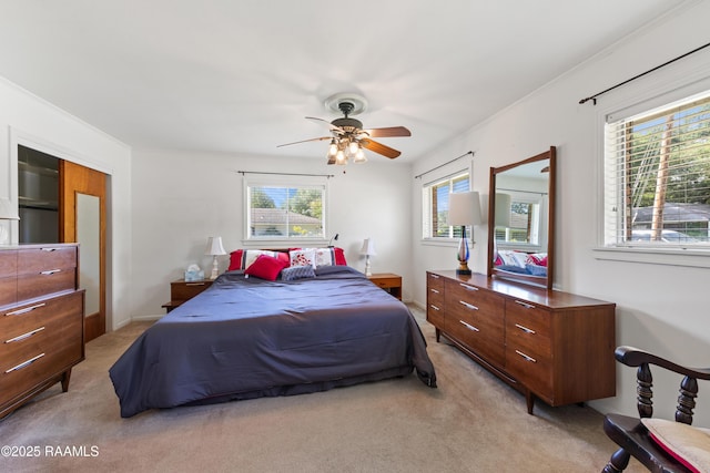 300 W Saint Louis St, Lafayette, LA 70506 - bedroom featuring light carpet and ceiling fan
