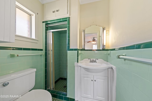 300 W Saint Louis St, Lafayette, LA 70506 - full bath featuring vanity, toilet, a wainscoted wall, a shower stall, and tile walls