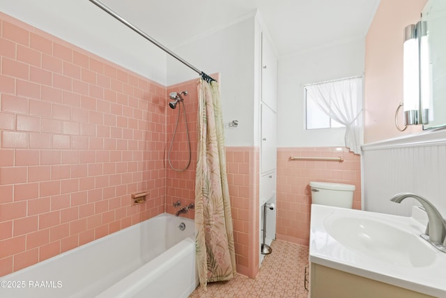 300 W Saint Louis St, Lafayette, LA 70506 - full bathroom with tile patterned floors, vanity, wainscoting, and shower / tub combo with curtain