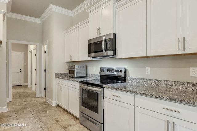 114 Marigold Ln, Maurice, LA 70555 - kitchen with light stone countertops, white cabinetry, stainless steel appliances, and crown molding