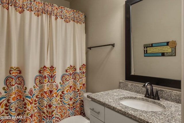 114 Marigold Ln, Maurice, LA 70555 - full bathroom featuring a shower with shower curtain, toilet, and vanity