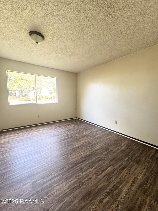 200 High Meadow Blvd Unit A-3A, Lafayette, LA 70507 - empty room with a textured ceiling and wood finished floors