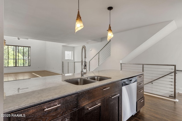 1201 S College Rd Unit 10, Lafayette, LA 70503 - kitchen with a sink, dishwasher, dark brown cabinetry, and dark wood-style floors