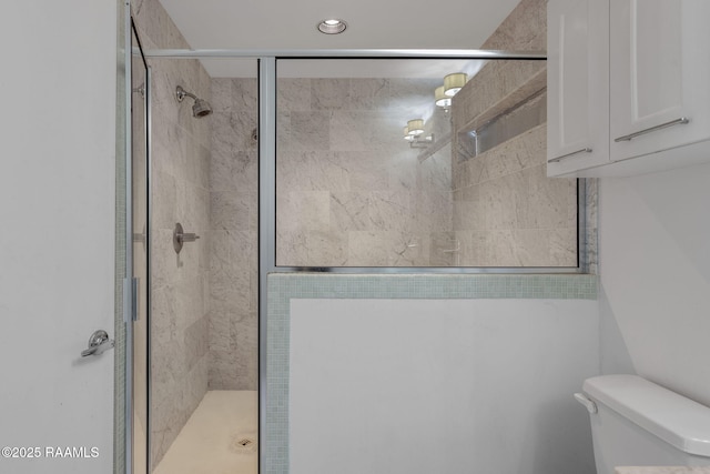 1201 S College Rd Unit 10, Lafayette, LA 70503 - bathroom with a stall shower and toilet