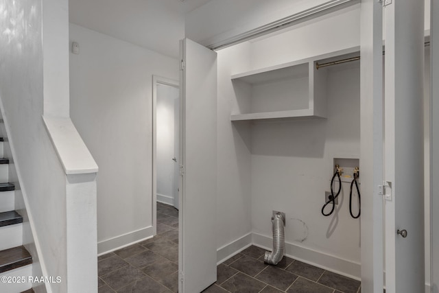 1201 S College Rd Unit 10, Lafayette, LA 70503 - laundry room featuring dark tile patterned flooring, baseboards, laundry area, and hookup for a washing machine