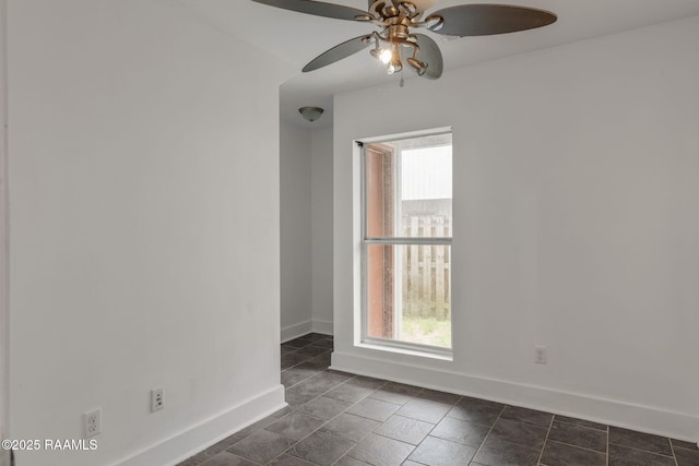 1201 S College Rd Unit 10, Lafayette, LA 70503 - unfurnished room with baseboards, plenty of natural light, and ceiling fan