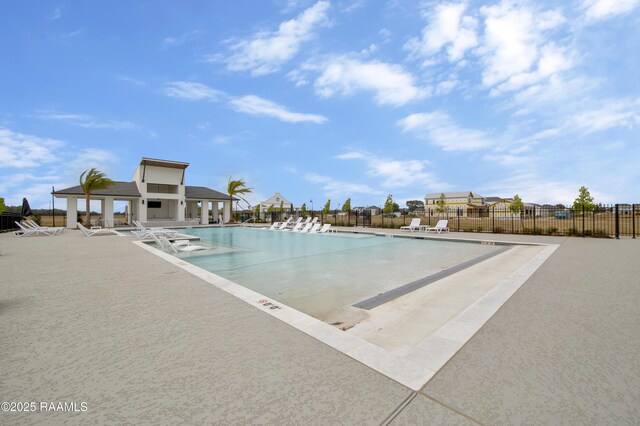 205 Keystone Dr, Scott, LA 70583 - community pool with a patio area