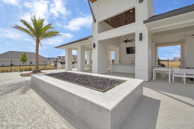 205 Keystone Dr, Scott, LA 70583 - view of patio / terrace featuring a ceiling fan and a bar