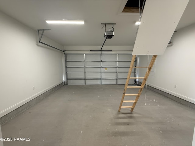 205 Keystone Dr, Scott, LA 70583 - garage with baseboards and a garage door opener