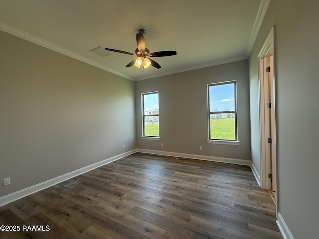 205 Keystone Dr, Scott, LA 70583 - empty room featuring plenty of natural light, ceiling fan, ornamental molding, and dark wood-style flooring