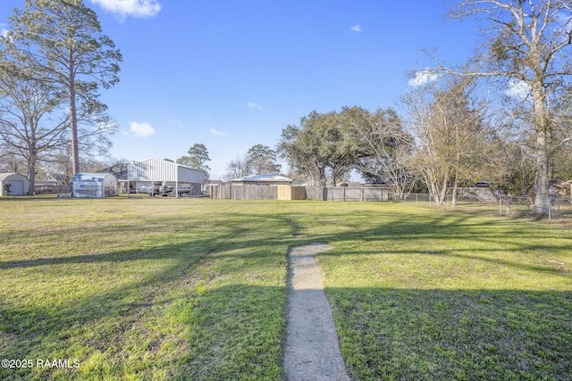 view of yard featuring fence