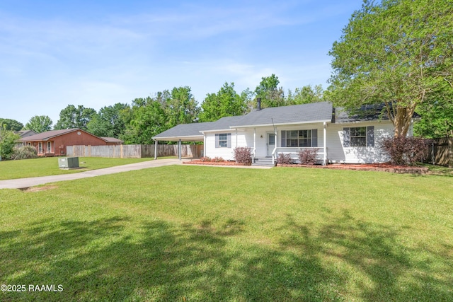 single story home with a carport, a front lawn, fence, and driveway