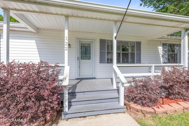 property entrance featuring covered porch