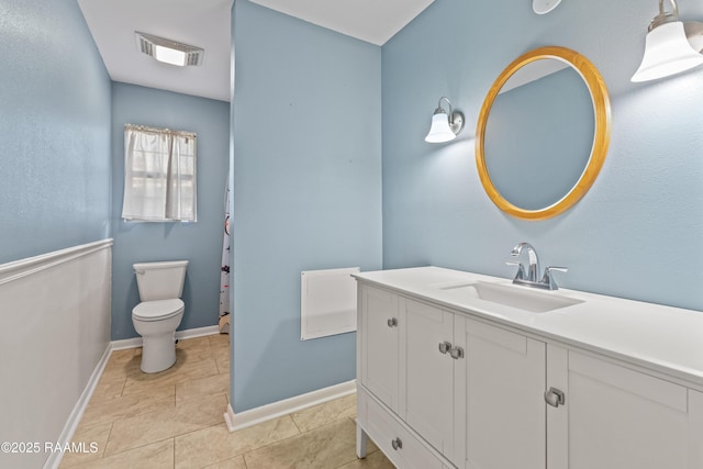 full bath with vanity, baseboards, tile patterned floors, toilet, and visible vents