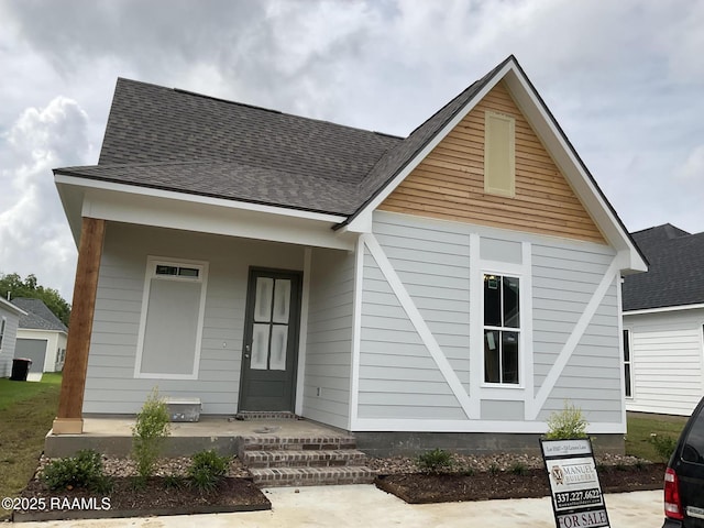 114 Lenova Ln, Lafayette, LA 70507 - view of front of home featuring covered porch and roof with shingles