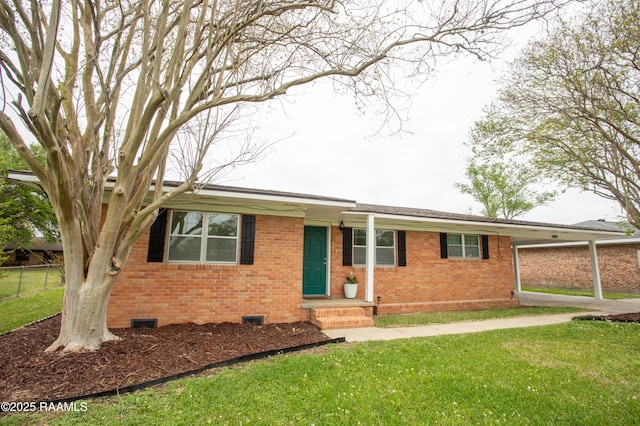 4189 Poydras Hwy, Breaux Bridge, LA 70517 - ranch-style home with a front yard, an attached carport, fence, brick siding, and crawl space