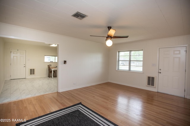 4189 Poydras Hwy, Breaux Bridge, LA 70517 - interior space with visible vents, wood finished floors, and a ceiling fan