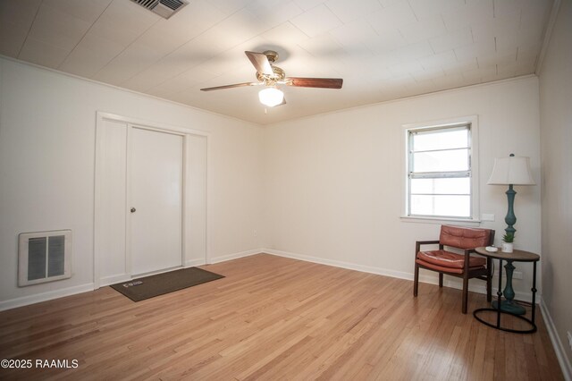 4189 Poydras Hwy, Breaux Bridge, LA 70517 - bedroom with baseboards, ornamental molding, visible vents, and light wood-style floors