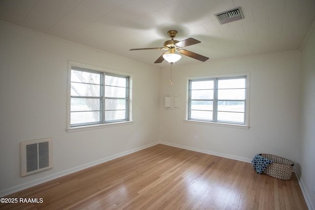 4189 Poydras Hwy, Breaux Bridge, LA 70517 - unfurnished room featuring a ceiling fan, crown molding, light wood finished floors, and visible vents
