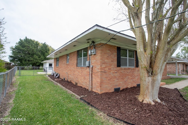 4189 Poydras Hwy, Breaux Bridge, LA 70517 - view of side of home with brick siding, fence, crawl space, and a yard