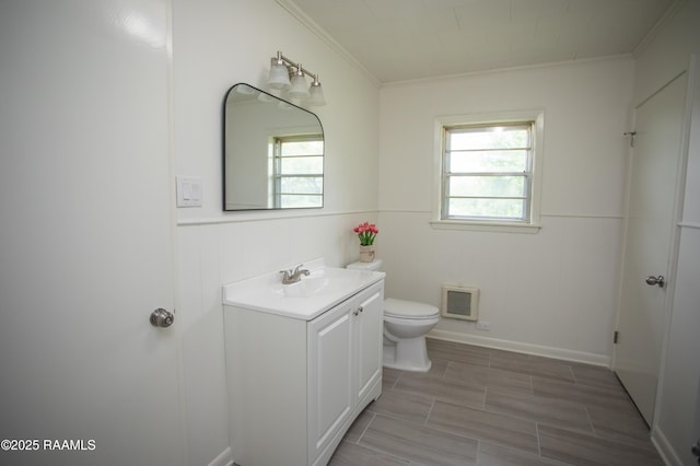4189 Poydras Hwy, Breaux Bridge, LA 70517 - bathroom featuring crown molding, toilet, and vanity