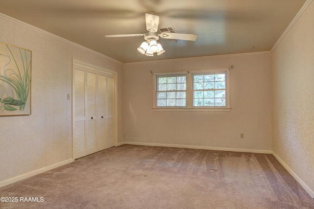 1217 Wellington Ave, Opelousas, LA 70570 - empty room featuring a ceiling fan, ornamental molding, visible vents, and carpet