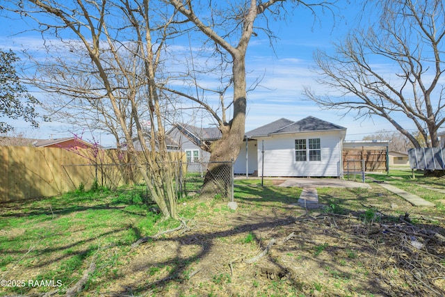 view of yard with fence
