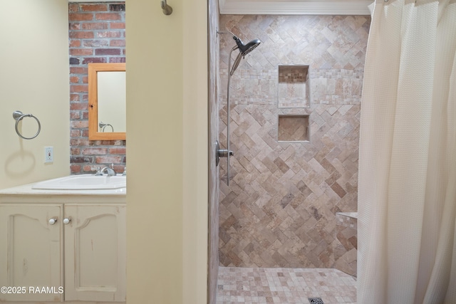 full bath with a shower stall and vanity