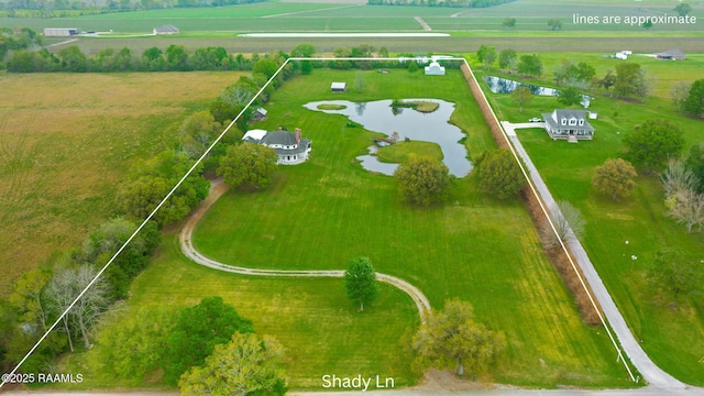 aerial view with a water view and a rural view