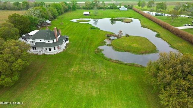 drone / aerial view featuring a water view